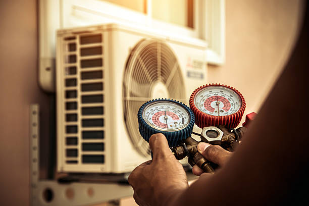 Professional Heat Pump Repair technician working in Riva, MD